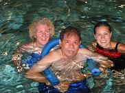 Henry Moss working with Carolyn and Lisa at Aqua Abilities